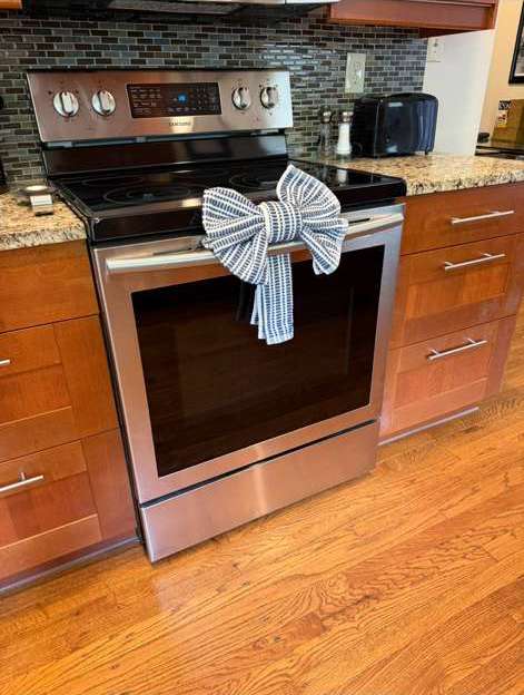 Spotless kitchen stove after deep cleaning